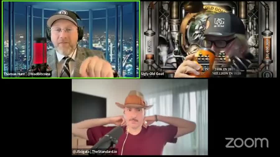 A video call grid with Thomas Hunt at top left and the Ugly Old Goat at top right in front of his painted backdrop.